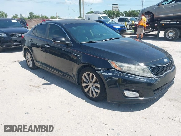 2014 Kia Optima EX with VIN 5XXGN4A72EG294381, listed as a IAAI auction lot 41944473 with 119,781 mi miles and . Bid and sale history available at carsss.com. Image 1.