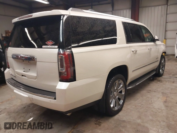 2015 GMC Yukon XL Denali with VIN 1GKS2JKJ1FR635901, listed as a IAAI auction lot 41805739 with 120,998 mi miles and . Bid and sale history available at carsss.com. Image 4.