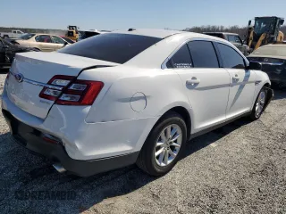 2014 Ford Taurus SE with VIN 1FAHP2D8XEG112805, listed as a Copart auction lot 48975265 with 127,730 mi miles and Salvage Title. Bid and sale history available at DreamBid. Image 3.