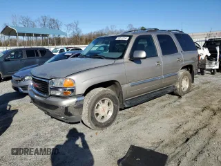 2001 GMC Yukon SLT with VIN 1GKEC13T71J223368, listed as a Copart auction lot 86610954 with 414,811 mi miles and Salvage Title. Bid and sale history available at carsss.com. Image 1.