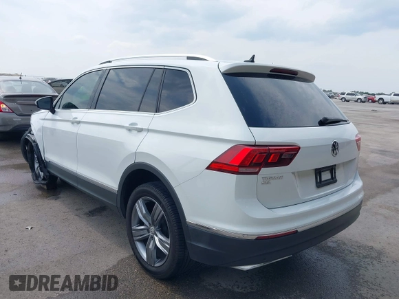 2020 Volkswagen Tiguan SE z VIN 3VV3B7AX4LM032609, wystawiony jako IAAI lot #42074359 z przebiegiem 52 404 mil mil oraz . Historia ofert i sprzedaży dostępna na DreamBid. Obrazek 3.