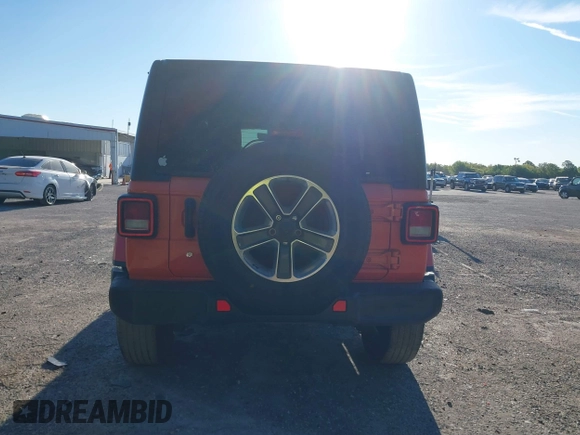 2018 Jeep Wrangler Unlimited Sahara with VIN 1C4HJXEG3JW323634, listed as a IAAI auction lot 41853471 with 126,531 mi miles. Bid and sale history available at carsss.com. Image 16.