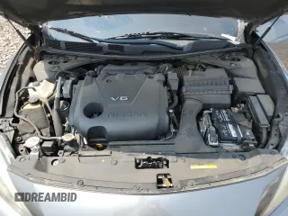 2017 Nissan Maxima SL z VIN 1N4AA6AP0HC367013, wystawiony jako Copart lot #59253975 z przebiegiem 136 834 mil mil oraz Szkoda całkowita • Salvage title. Historia ofert i sprzedaży dostępna na DreamBid. Obrazek 11.