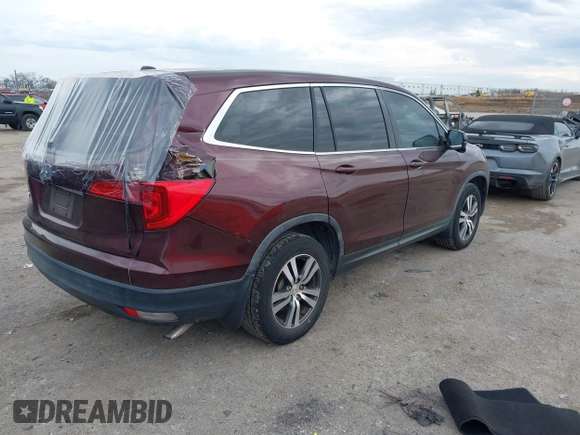 2016 Honda Pilot EX-L with VIN 5FNYF5H58GB026209, listed as a IAAI auction lot 41333088 with 129,484 mi miles and . Bid and sale history available at DreamBid. Image 4.
