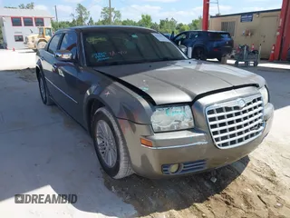 2010 Chrysler 300 Touring with VIN 2C3CA5CV5AH233033, listed as a IAAI auction lot 42130676 with 158,323 mi miles and . Bid and sale history available at DreamBid. Image 1.