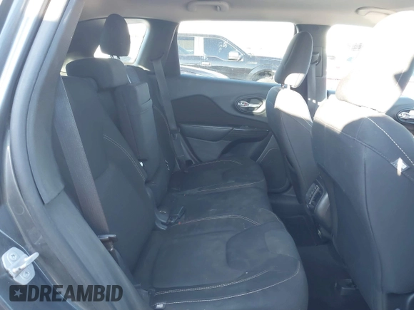 2016 Jeep Cherokee Altitude with VIN 1C4PJLCS8GW173279, listed as a IAAI auction lot 41129117 with 163,978 mi miles. Bid and sale history available at carsss.com. Image 8.