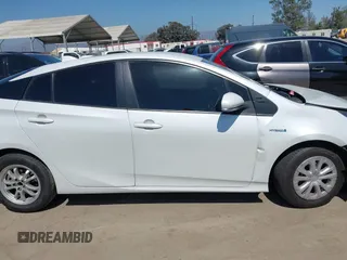 2021 Toyota Prius L Eco with VIN JTDKAMFU8M3135142, listed as a IAAI auction lot 42317007 with 77,353 mi miles and . Bid and sale history available at DreamBid. Image 13.