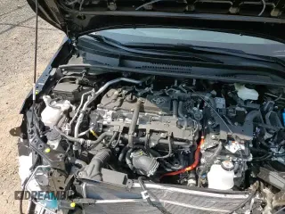 2025 Toyota Corolla Hybrid LE with VIN JTDBCMFE5SJ039593, listed as a Copart auction lot 65724625 with 7,042 mi miles and Salvage title. Bid and sale history available at DreamBid. Image 13.