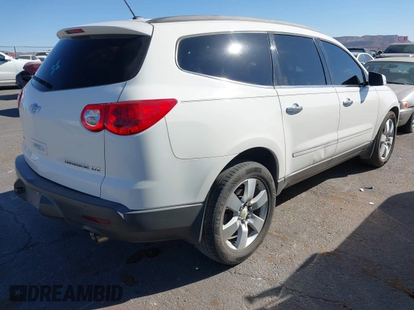 2011 Chevrolet Traverse LTZ with VIN 1GNKVLED4BJ369150, listed as a IAAI auction lot 41733465 with 168,655 mi miles and . Bid and sale history available at DreamBid. Image 4.