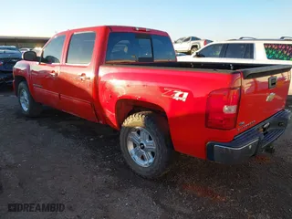 2009 Chevrolet Silverado 1500 LTZ with VIN 3GCEK33309G220674, listed as a IAAI auction lot 41240093 with 181,634 mi miles. Bid and sale history available at carsss.com. Image 3.