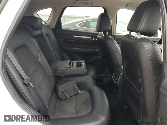 2020 Mazda CX-5 Touring z VIN JM3KFBCM8L1789067, wystawiony jako Copart lot #54953015 z przebiegiem 134 306 mil mil oraz Nie do naprawy • Non repairable. Historia ofert i sprzedaży dostępna na DreamBid. Obrazek 11.