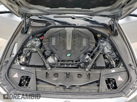 2016 BMW 5 Series 550i with VIN WBAKN9C57GD962477, listed as a Copart auction lot 57103575 with 57,574 mi miles and Clean title. Bid and sale history available at DreamBid. Image 7.
