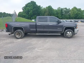 2015 Chevrolet Silverado 3500HD LTZ z VIN 1GC4K0C85FF127359, wystawiony jako IAAI lot #42252408 z przebiegiem 273 905 mil mil oraz . Historia ofert i sprzedaży dostępna na DreamBid. Obrazek 14.