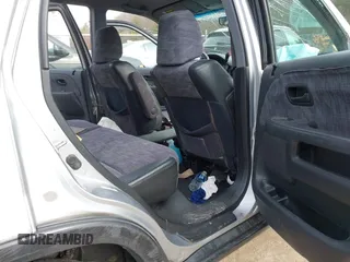 2002 Honda CR-V LX z VIN JHLRD78532C050707, wystawiony jako IAAI lot #41704967 z przebiegiem 306 564 mil mil oraz . Historia ofert i sprzedaży dostępna na DreamBid. Obrazek 8.