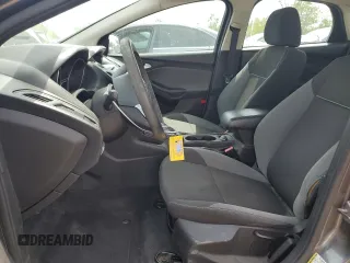 2013 Ford Focus SE с VIN 1FADP3F2XDL126674, выставлен на аукционе Copart как лот 57043615 с пробегом 126 313 миль миль и Списание • Salvage title. История ставок и продаж доступна на DreamBid. Изображение 7.