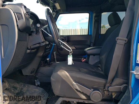 2016 Jeep Wrangler Unlimited Sport z VIN 1C4BJWDG3GL115622, wystawiony jako Copart lot #57872455 z przebiegiem 98 812 mil mil oraz Szkoda całkowita • Salvage title. Historia ofert i sprzedaży dostępna na DreamBid. Obrazek 7.