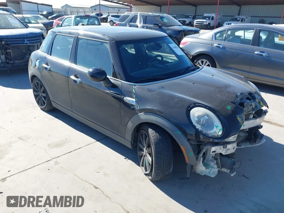 2015 MINI Hardtop 4 Door S with VIN WMWXU3C53F2B56459, listed as a IAAI auction lot 41400624 with 233,850 mi miles and . Bid and sale history available at DreamBid. Image 1.