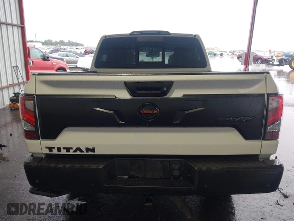 2021 Nissan Titan Pro-4X z VIN 1N6AA1ED7MN511004, wystawiony jako IAAI lot #42184599 z przebiegiem 36 086 mil mil oraz . Historia ofert i sprzedaży dostępna na DreamBid. Obrazek 17.