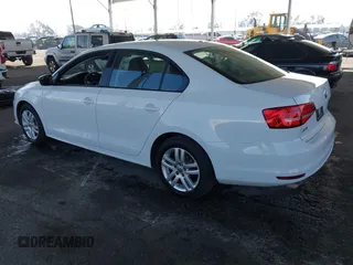 2015 Volkswagen Jetta Sedan 2.0L S with VIN 3VW2K7AJ3FM253125, listed as a IAAI auction lot 41535632 with 103,953 mi miles. Bid and sale history available at carsss.com. Image 3.