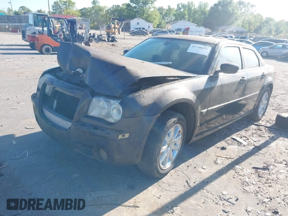 2006 Chrysler 300 C SRT8 with VIN 2C3KA73W16H399430, listed as a IAAI auction lot 41748693 with 1 mi miles. Bid and sale history available at carsss.com. Image 2.
