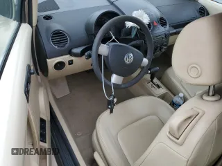 2006 Volkswagen Beetle z VIN 3VWPF31Y06M309862, wystawiony jako Copart lot #76907554 z przebiegiem Nie podano mil oraz Szkoda całkowita • Salvage title. Historia ofert i sprzedaży dostępna na DreamBid. Obrazek 8.