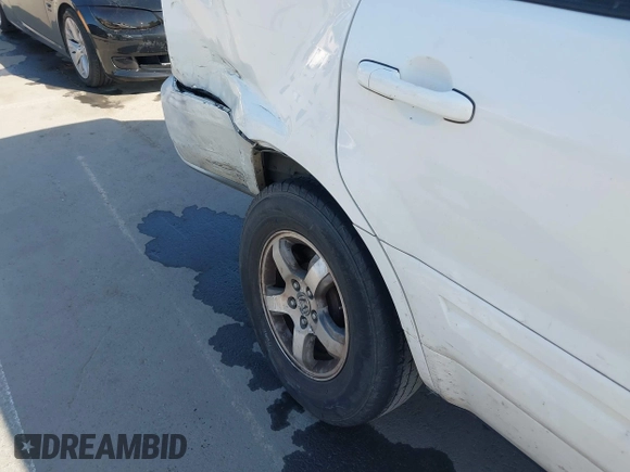 2006 Honda Pilot EX-L with VIN 2HKYF18746H517810, listed as a IAAI auction lot 41990178 with 184,679 mi miles and . Bid and sale history available at DreamBid. Image 12.
