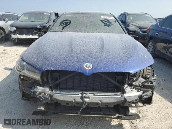 2023 BMW M5 with VIN WBS83CH06PCM62287, listed as a Copart auction lot 54581894 with 0 mi miles and Salvage Title. Bid and sale history available at carsss.com. Image 5.