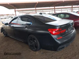 2018 BMW 7 Series 750i z VIN WBA7F0C53JGM23522, wystawiony jako IAAI lot #41789290 z przebiegiem Nie podano mil oraz . Historia ofert i sprzedaży dostępna na DreamBid. Obrazek 3.