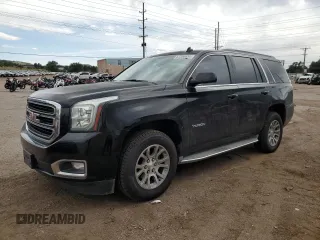 2015 GMC Yukon SLE with VIN 1GKS2AKC3FR120819, listed as a Copart auction lot 63354434 with 115,669 mi miles and Clean Title. Bid and sale history available at carsss.com. Image 1.