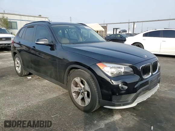 2015 BMW X1 sDrive28i with VIN WBAVM1C50FV315123, listed as a Copart auction lot 87255134 with 96,063 mi miles and Salvage Title. Bid and sale history available at carsss.com. Image 10.