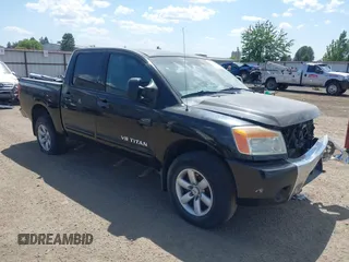 2011 Nissan Titan SL with VIN 1N6AA0EC2BN306740, listed as a IAAI auction lot 40088364 with 185,416 mi miles and . Bid and sale history available at DreamBid. Image 1.