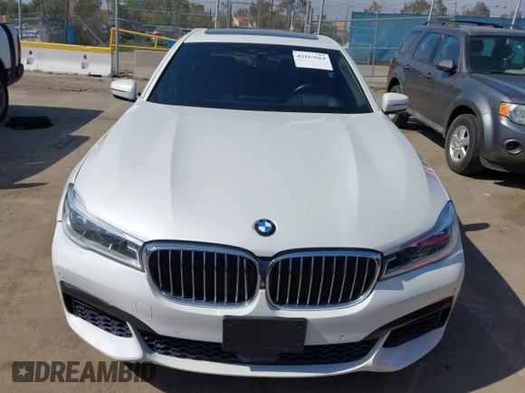 2019 BMW 7 Series 750i with VIN WBA7F0C5XKGM25771, listed as a IAAI auction lot 42167614 with 73,692 mi miles. Bid and sale history available at carsss.com. Image 6.