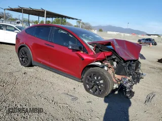 2023 Tesla Model X with VIN 7SAXCBE54PF426469, listed as a Copart auction lot 51019955 with Not Provided miles and Salvage Title. Bid and sale history available at DreamBid. Image 4.