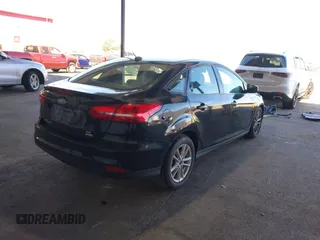 2017 Ford Focus SE with VIN 1FADP3F26HL219875, listed as a IAAI auction lot 41756026 with 70,493 mi miles. Bid and sale history available at carsss.com. Image 4.