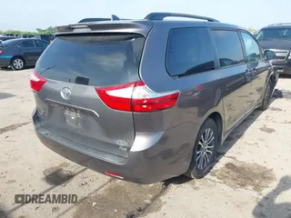 2018 Toyota Sienna XLE Auto Access Seat z VIN 5TDYZ3DC9JS949804, wystawiony jako IAAI lot #42207235 z przebiegiem 148 044 mil mil oraz . Historia ofert i sprzedaży dostępna na DreamBid. Obrazek 4.