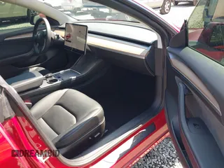 2021 Tesla Model 3 Long Range with VIN 5YJ3E1EB6MF054361, listed as a IAAI auction lot 42105247 with 58,986 mi miles and . Bid and sale history available at carsss.com. Image 5.