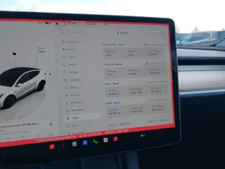 2023 Tesla Model Y Long Range with VIN 7SAYGDEE2PA059668, listed as a IAAI auction lot 41901079 with 58,276 mi miles. Bid and sale history available at carsss.com. Image 7.