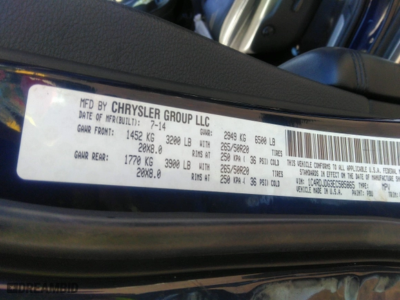 2014 Dodge Durango Limited with VIN 1C4RDJDG3EC585865, listed as a IAAI auction lot 40136282 with 68,046 mi miles. Bid and sale history available at carsss.com. Image 9.