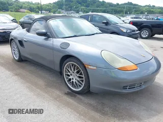 2001 Porsche Boxster z VIN WP0CA29861U620277, wystawiony jako IAAI lot #42139203 z przebiegiem 120 788 mil mil oraz . Historia ofert i sprzedaży dostępna na DreamBid. Obrazek 1.