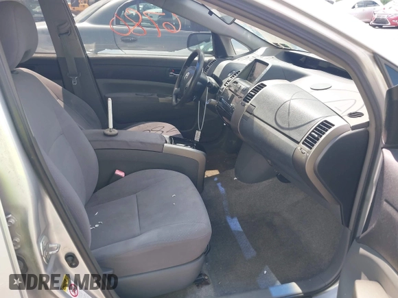 2007 Toyota Prius z VIN JTDKB20U677677900, wystawiony jako IAAI lot #42176780 z przebiegiem 246 442 mil mil oraz . Historia ofert i sprzedaży dostępna na DreamBid. Obrazek 5.