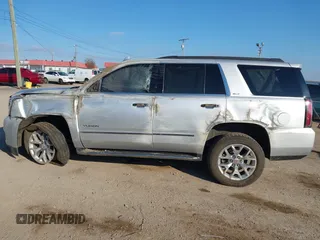 2020 GMC Yukon SLT Standard Edition with VIN 1GKS2DKCXLR294027, listed as a IAAI auction lot 41004965 with 69,161 mi miles. Bid and sale history available at carsss.com. Image 14.