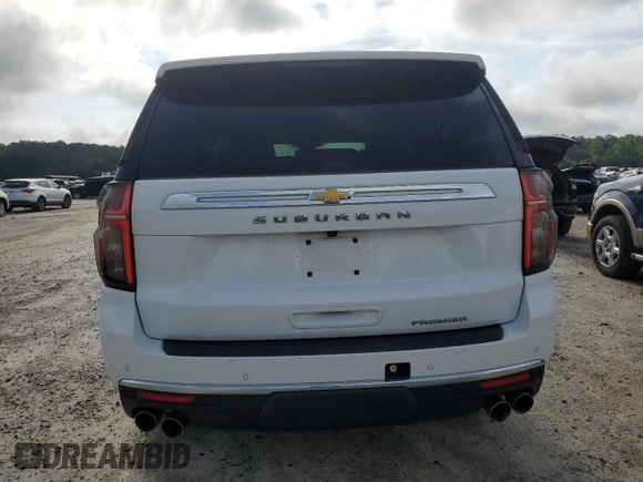 2023 Chevrolet Suburban Premier z VIN 1GNSCFKD0PR504435, wystawiony jako Copart lot #60309665 z przebiegiem 50 744 mil mil oraz Czysty tytuł • Clean title. Historia ofert i sprzedaży dostępna na DreamBid. Obrazek 6.