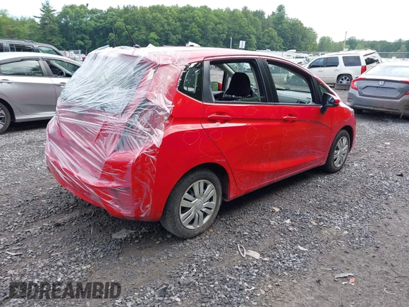 2016 Honda Fit LX with VIN JHMGK5H55GX012649, listed as a IAAI auction lot 42657017 with 82,043 mi miles and . Bid and sale history available at DreamBid. Image 4.