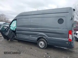2023 Ford Transit Cargo z VIN 1FTBW3X86PKC01923, wystawiony jako IAAI lot #41886513 z przebiegiem 148 658 mil mil oraz . Historia ofert i sprzedaży dostępna na DreamBid. Obrazek 3.
