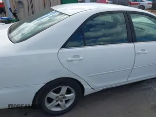 2002 Toyota Camry LE z VIN JTDBE32K020030113, wystawiony jako IAAI lot #41210452 z przebiegiem 190 486 mil mil oraz . Historia ofert i sprzedaży dostępna na DreamBid. Obrazek 6.