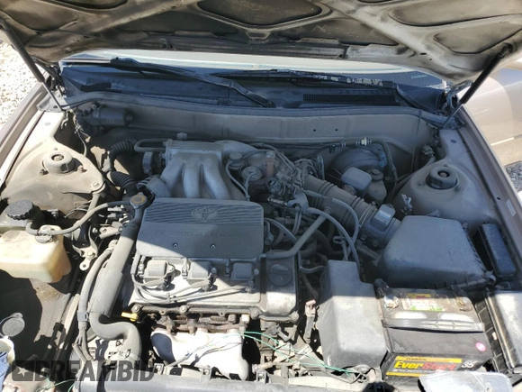1996 Toyota Camry LE with VIN 4T1BF12K3TU132870, listed as a Copart auction lot 58052975 with 88,210 mi miles and Salvage title. Bid and sale history available at DreamBid. Image 11.