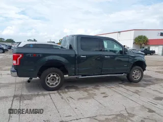 2015 Ford F-150 XLT with VIN 1FTEW1EG5FFA99713, listed as a IAAI auction lot 42481854 with 165,415 mi miles and . Bid and sale history available at DreamBid. Image 13.