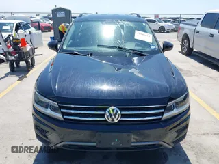2021 Volkswagen Tiguan S with VIN 3VV1B7AX9MM067347, listed as a IAAI auction lot 42305101 with 77,042 mi miles and . Bid and sale history available at DreamBid. Image 17.