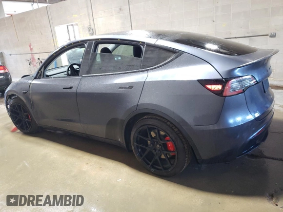 2021 Tesla Model Y Performance with VIN 5YJYGDEF2MF134700, listed as a Copart auction lot 56325685 with 66,730 mi miles and Salvage Title. Bid and sale history available at DreamBid. Image 2.