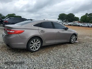 2013 Hyundai Azera z VIN KMHFH4JG4DA262993, wystawiony jako Copart lot #58497925 z przebiegiem 151 568 mil mil oraz Szkoda całkowita • Salvage title. Historia ofert i sprzedaży dostępna na DreamBid. Obrazek 3.